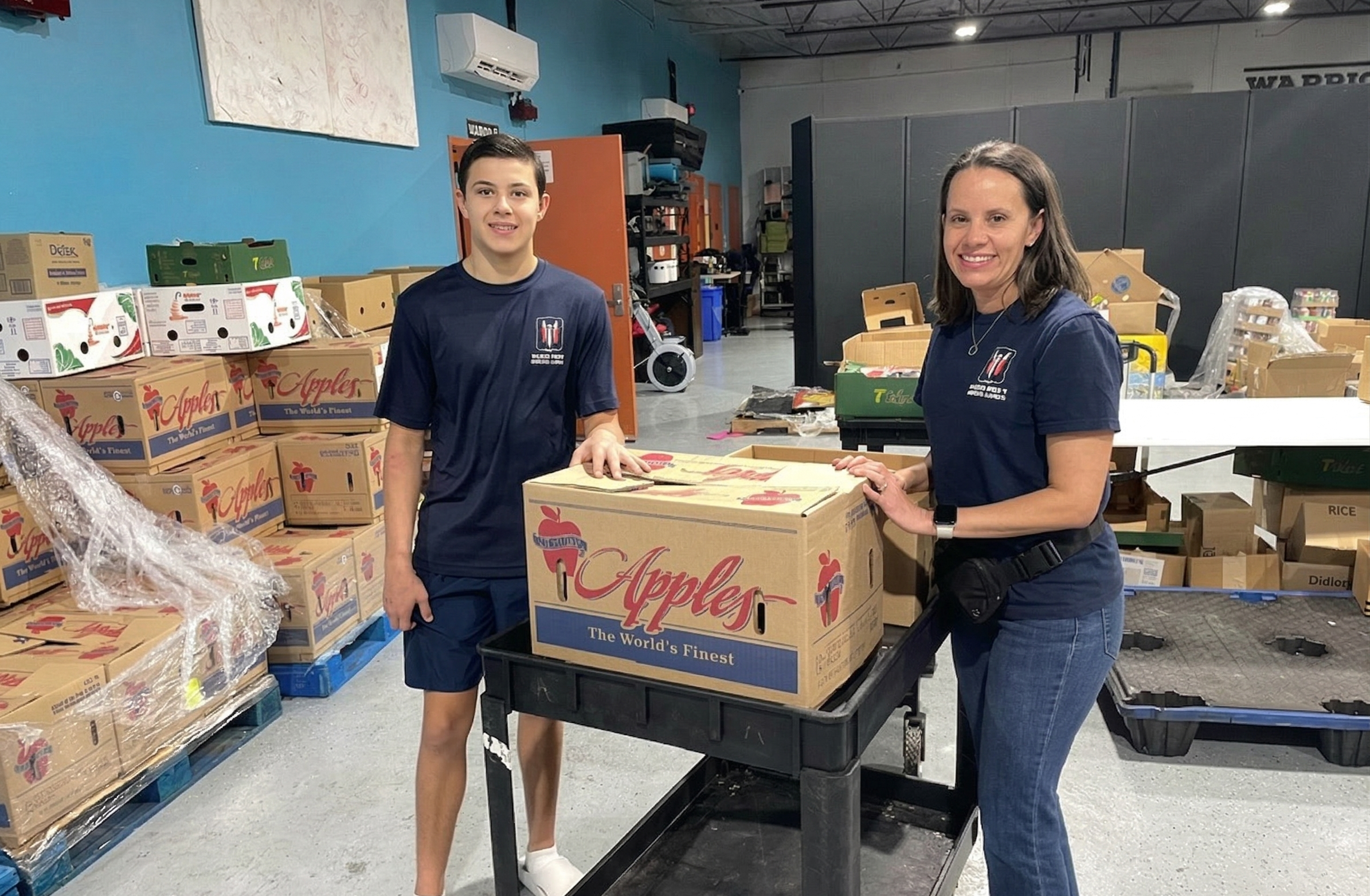 Volunteers sorting boxes in the Food Pantry