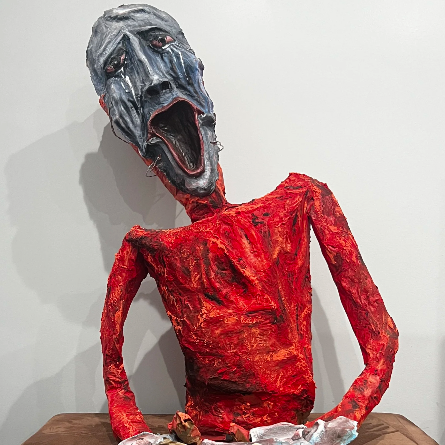 Sculpture With Masks (2024) (Paper Mache, Acrylic Paint, Spray Paint, Barbed Wire, Ribbon)