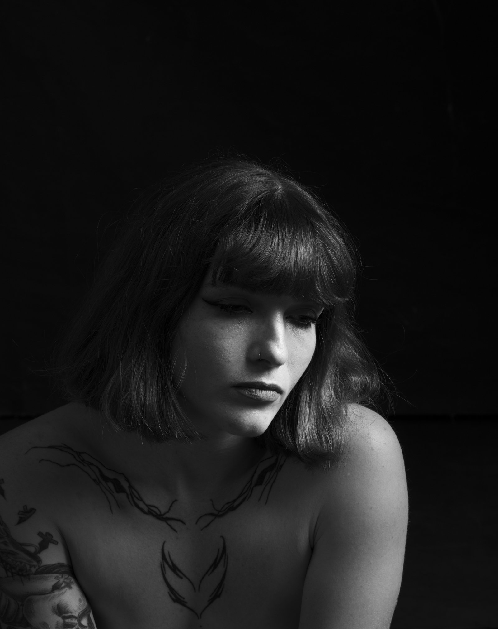 Painterly photography capturing a quiet moment of reflection in the People series.