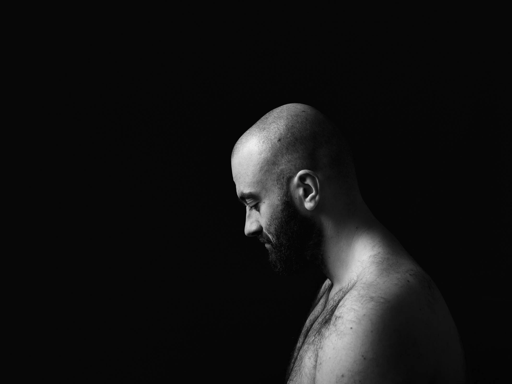 Artistic study of light and shadow on the human form, inspired by Renaissance paintings.