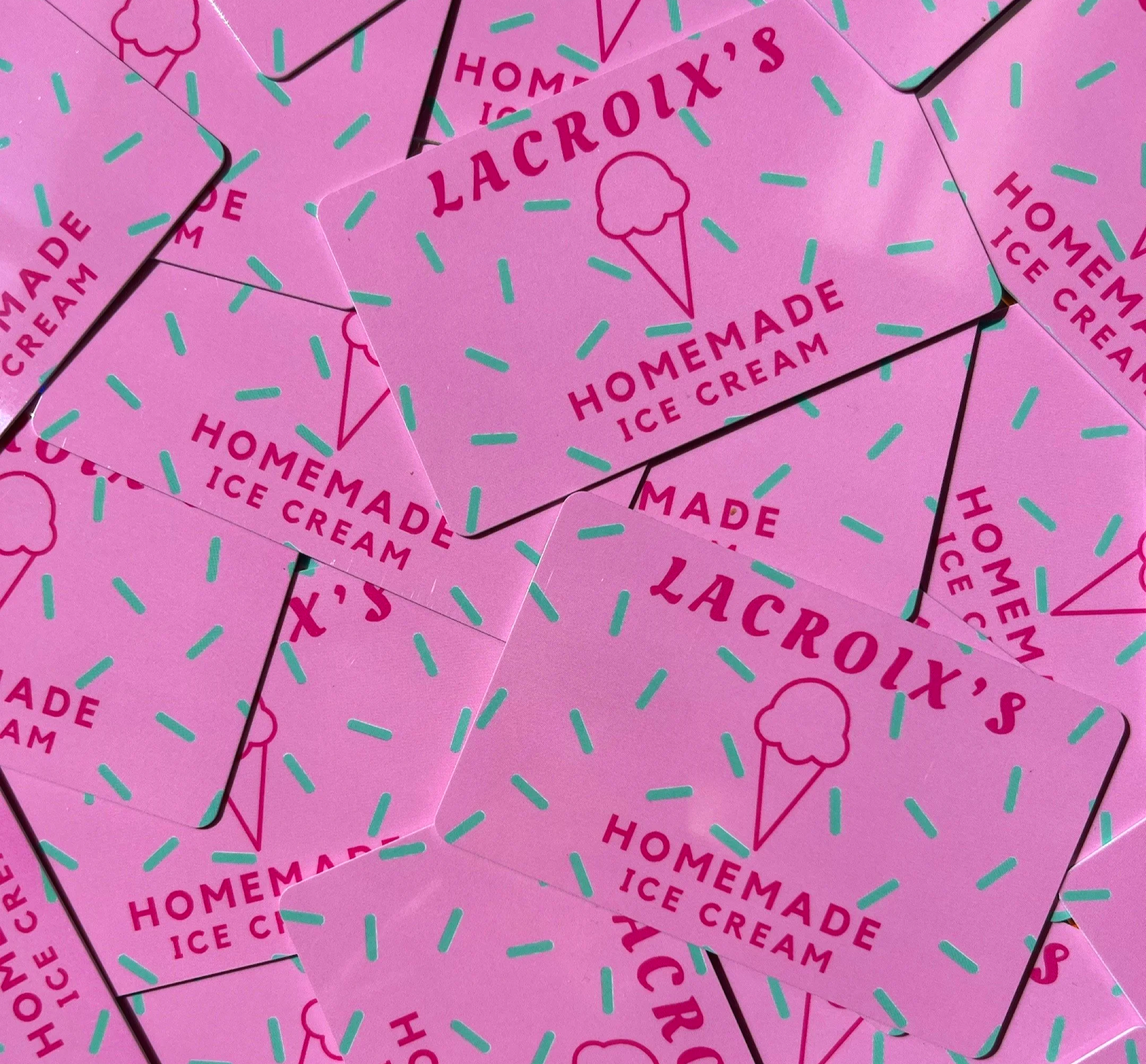 Pink gift cards with the words "Lacroix's Homemade Ice Cream," an ice cream cone graphic, and teal dash marks pattern.