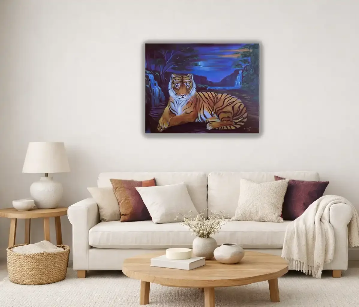 Living room with beige sofa, multicolored pillows, wooden coffee table with vases and a book, wall art of a tiger in a landscape