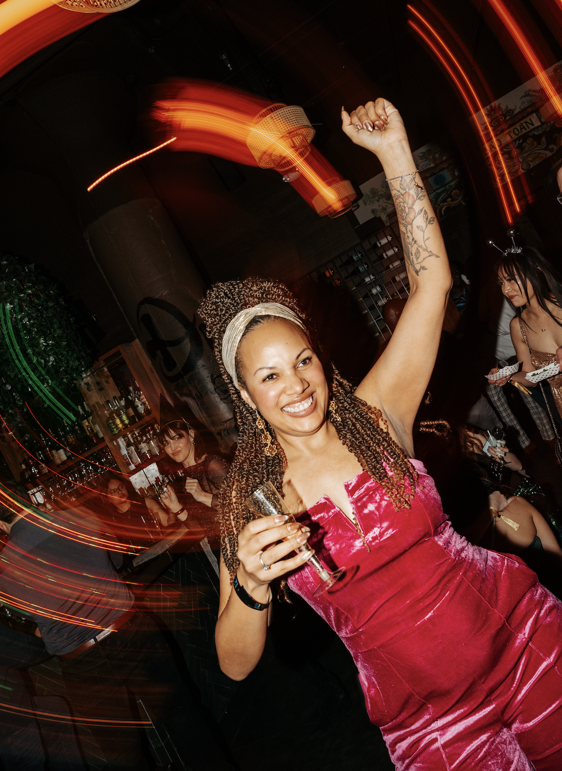 Woman with braided hair wearing a pink dress celebrating with a drink at a lively party. 

Meredith Avery Photography, Memphis Event Photography, Memphis Event Photographer, Best Event Photographer, Best Memphis Event Photography, Best Memphis Event 