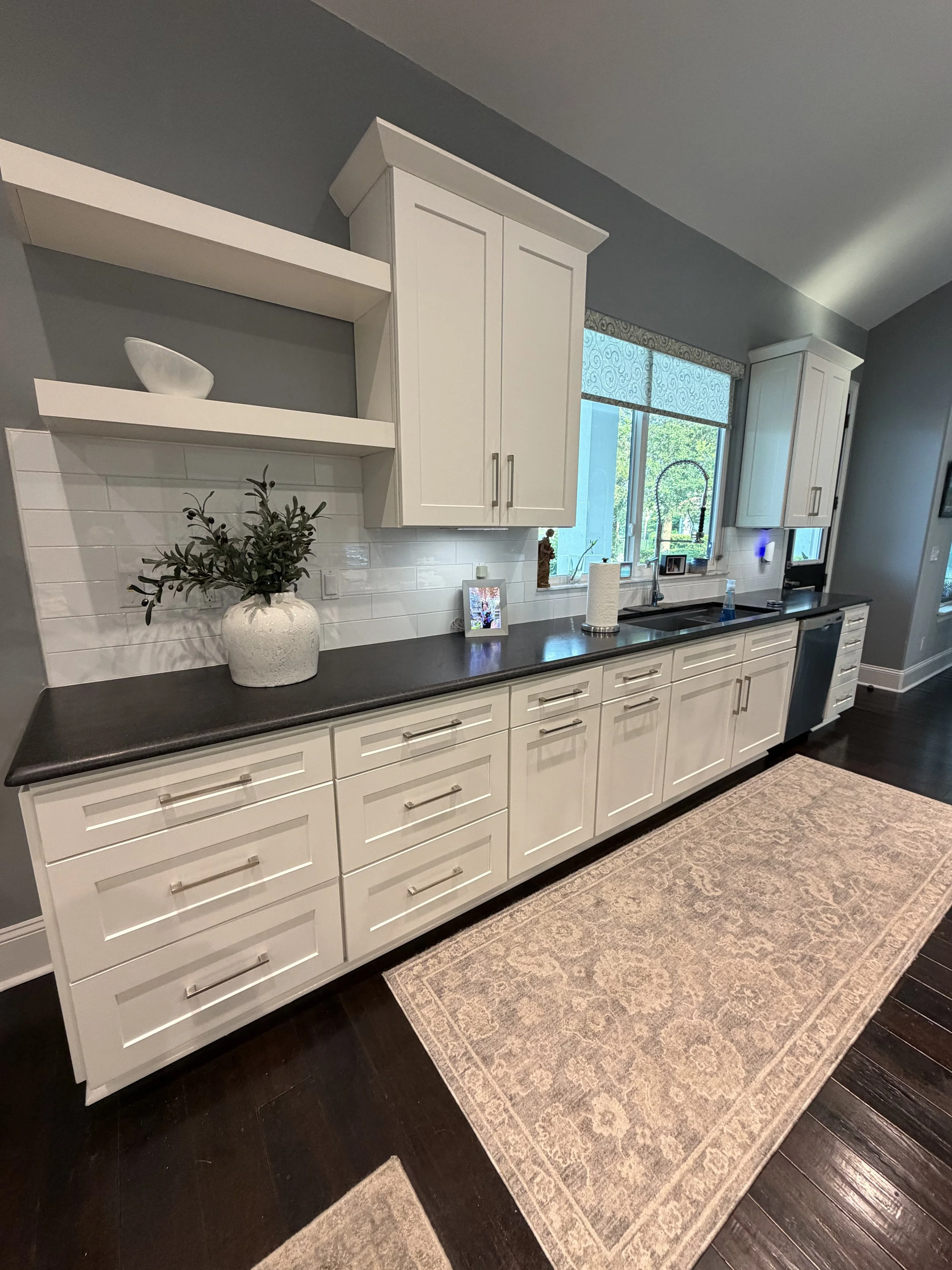 Completed kitchen with professionally refinished white cabinets in alabaster