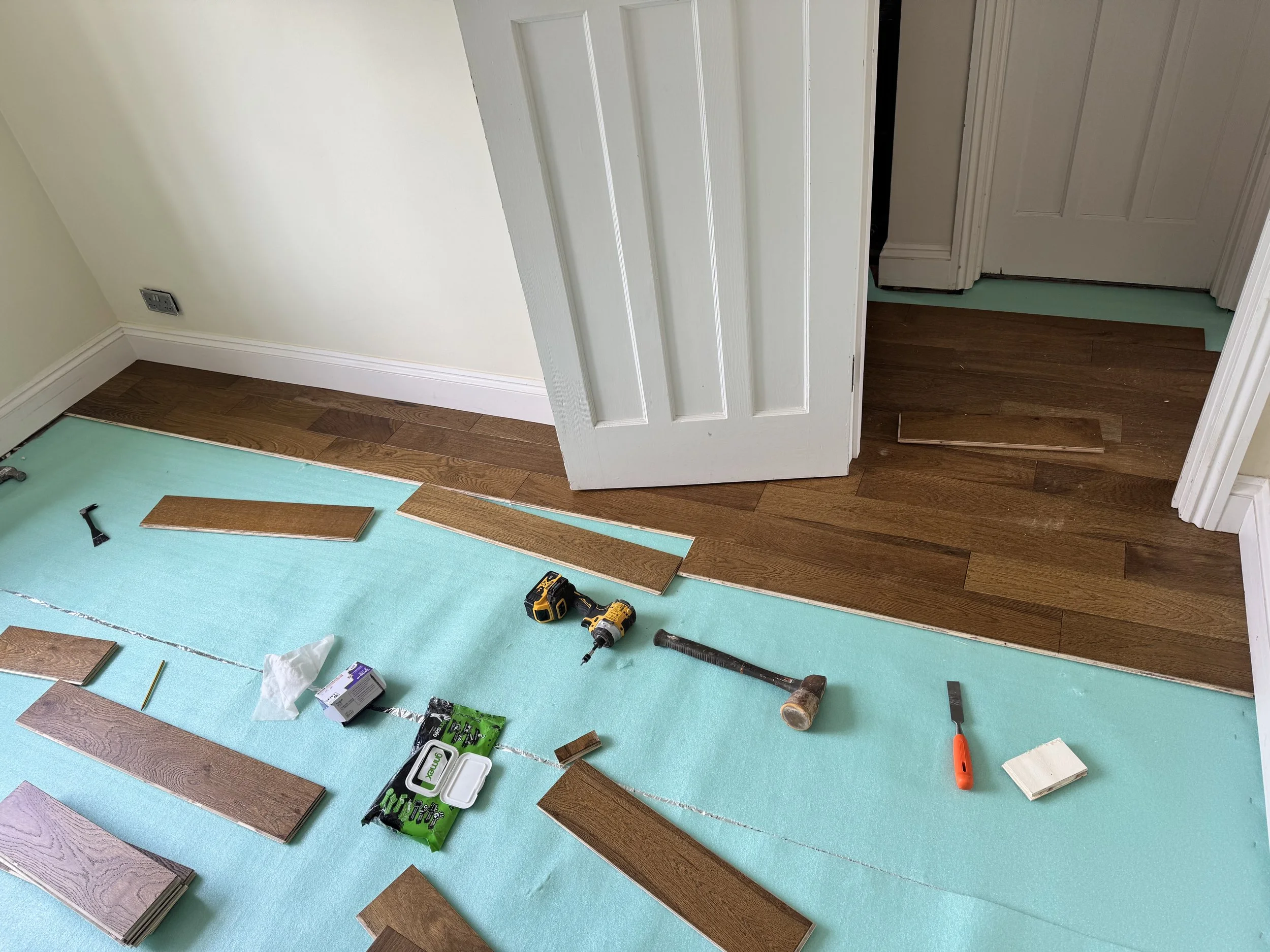 Engineered oak flooring being installed in a domestic property in Coventry, West Midlands