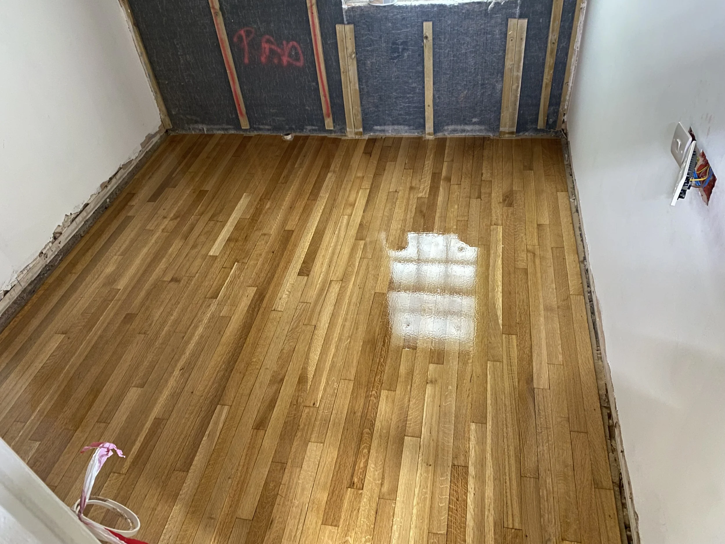 Finished solid oak strip floor with oil finish at Florence Boot Hall accommodation, University of Nottingham