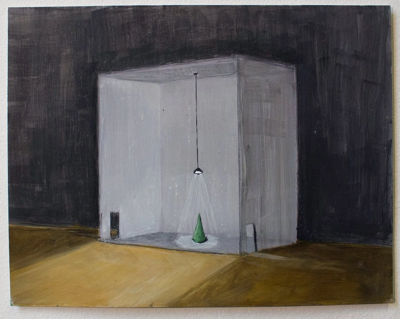 A small art installation in a corner of a room, featuring a green cone on the floor, a ribbon of light projected from a ceiling spotlight, and two small black objects on the walls near the floor.