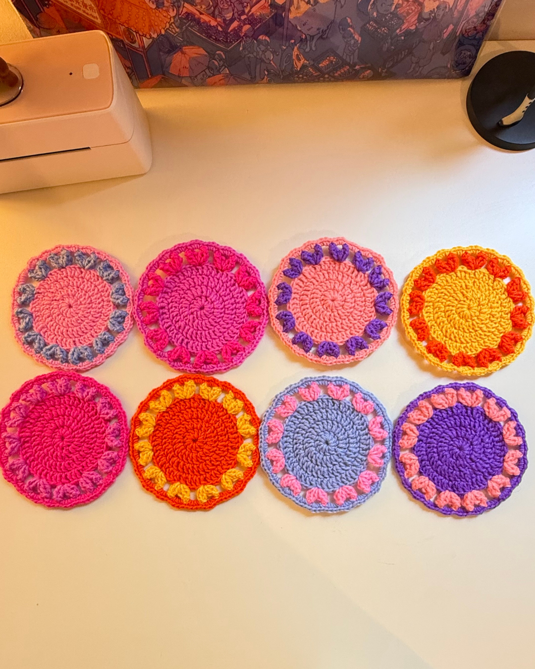 crochet-coasters-multi-color-design-with-hearts.png