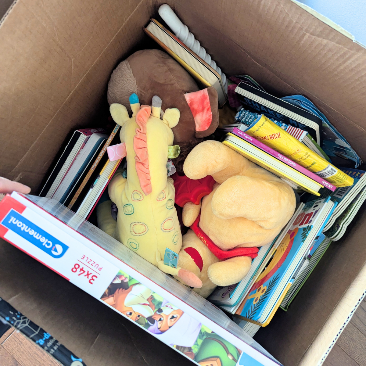 Box of toys and books for donation