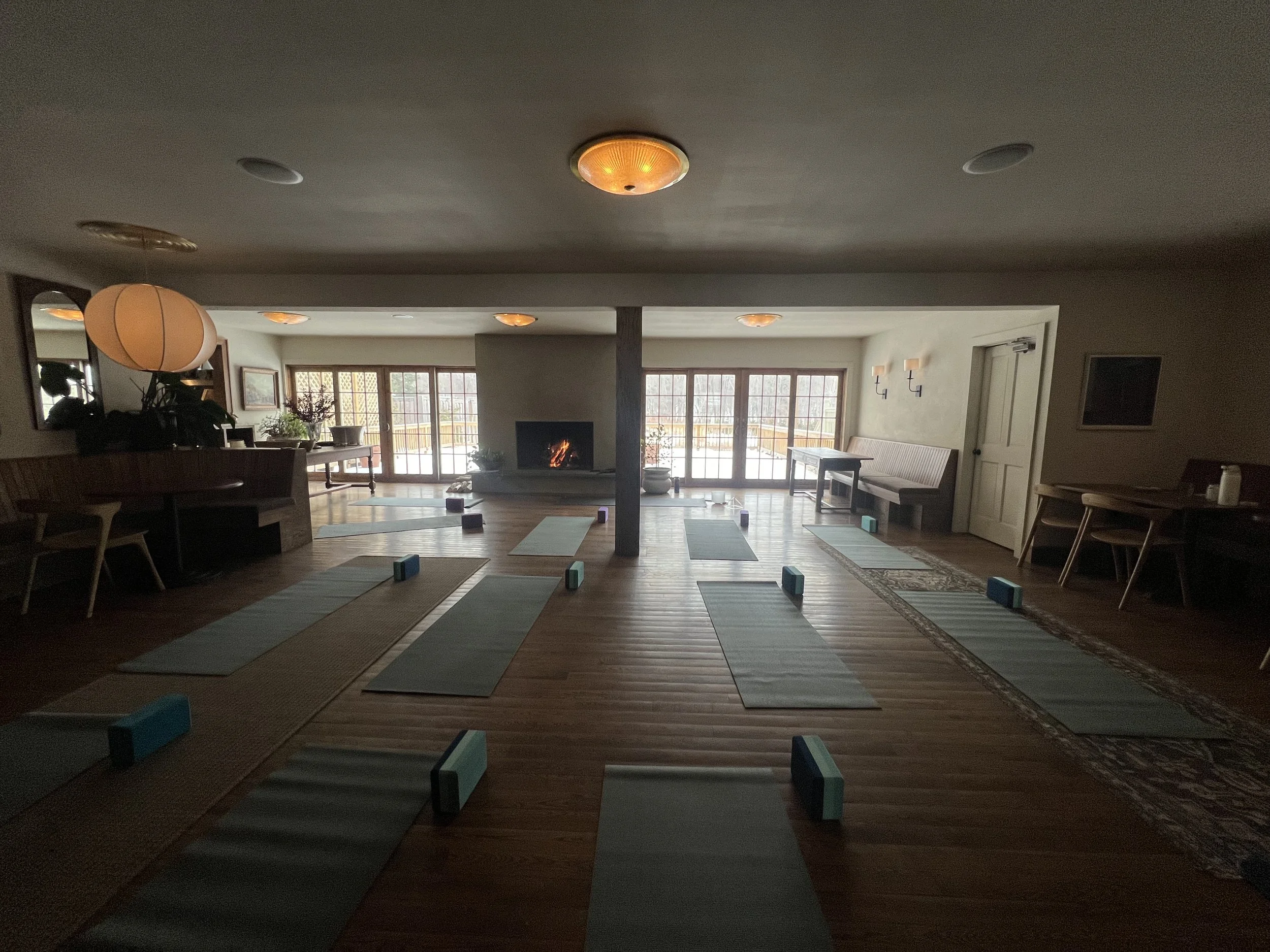 Corporate retreat yoga class with mats and blocks arranged in a boutique hotel, Windham NY