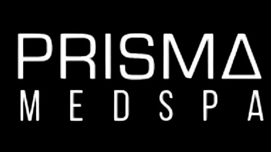 A black background with the words 'PRISMA MED SPA' in white capital letters, with a stylized triangle replacing the letter 'A' in 'PRISMA'.