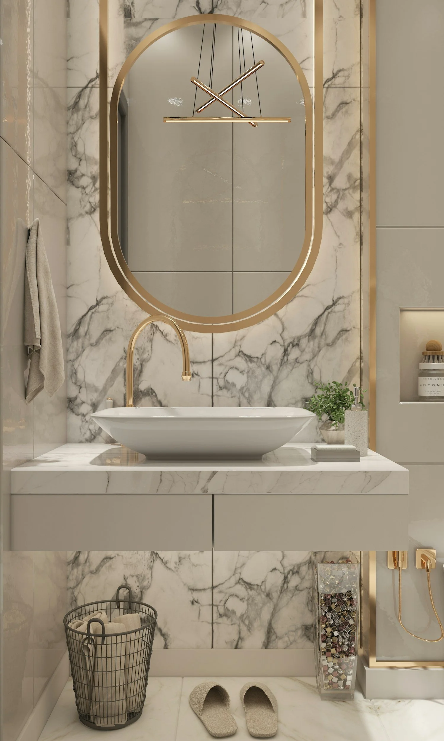 A luxurious bathroom with a marble wall and vanity, an oval mirror with a gold frame, a vessel sink with a gold faucet, a modern chandelier, and various decorative elements including a potted plant, a towel, slippers, and storage accessories.