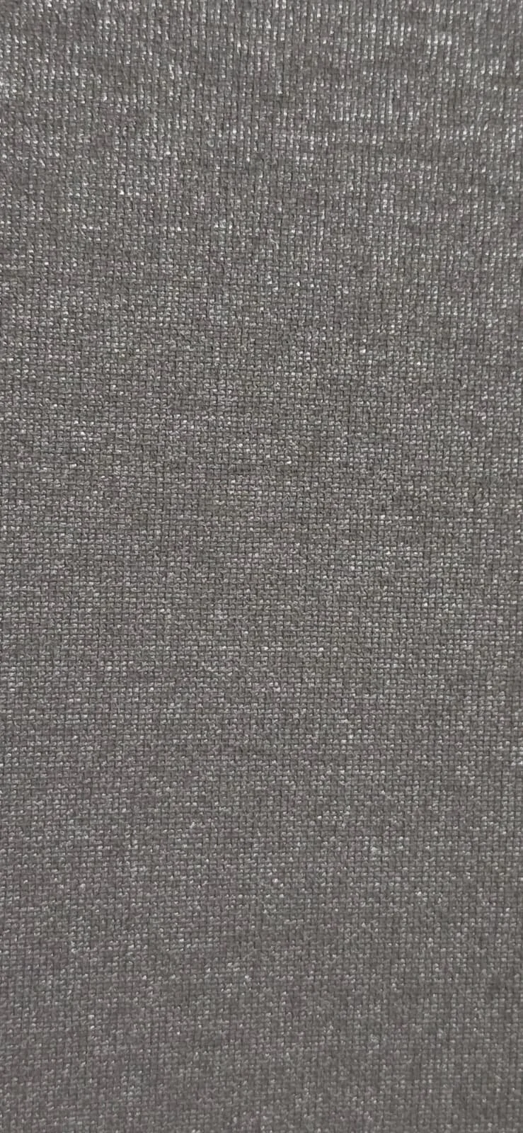 Close-up of a textured gray fabric surface.