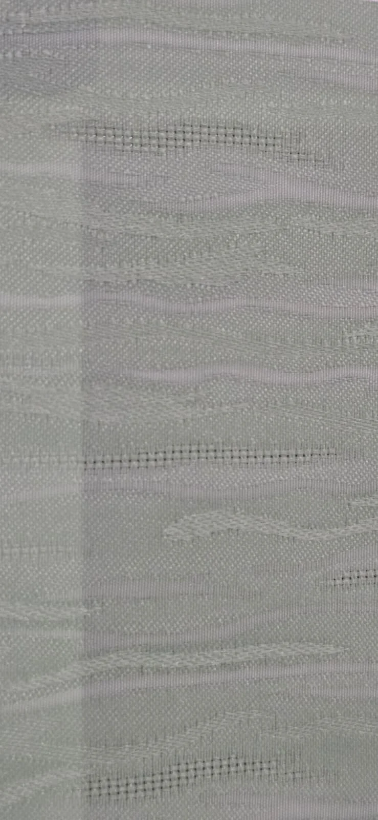 Close-up of a textured light-colored fabric with a horizontal striped pattern.
