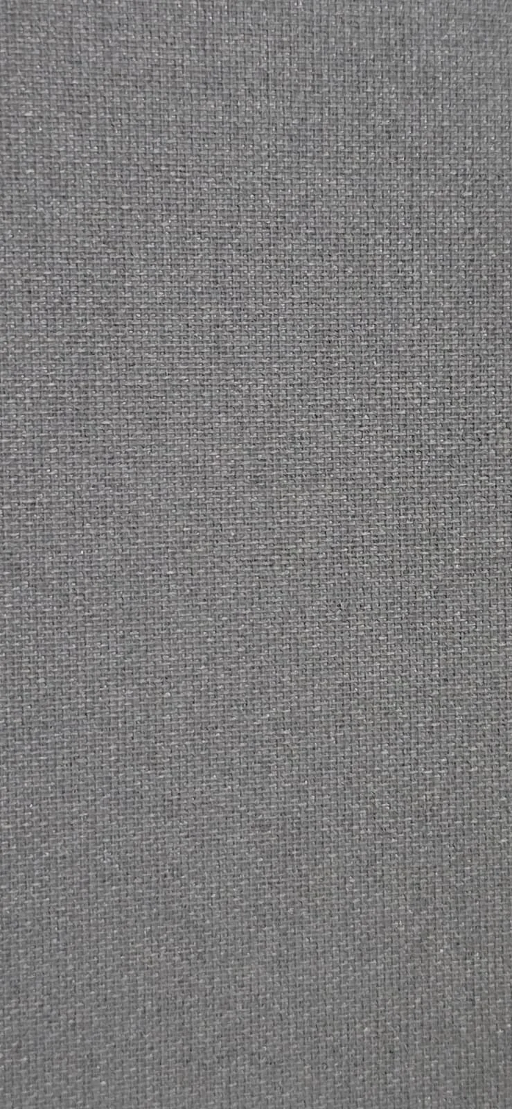 Close-up of gray fabric texture with a woven pattern.