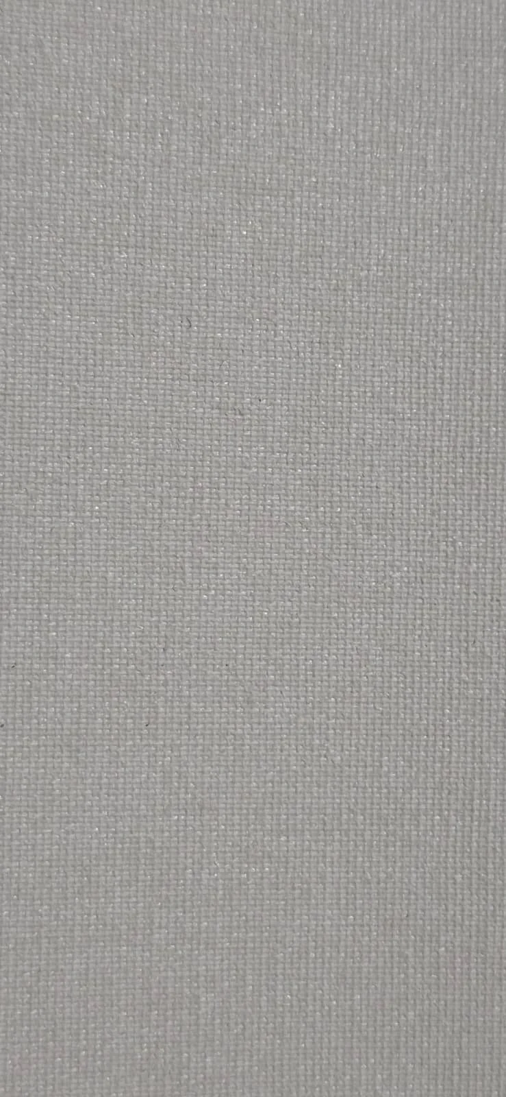 Close-up of a textured, gray fabric surface.