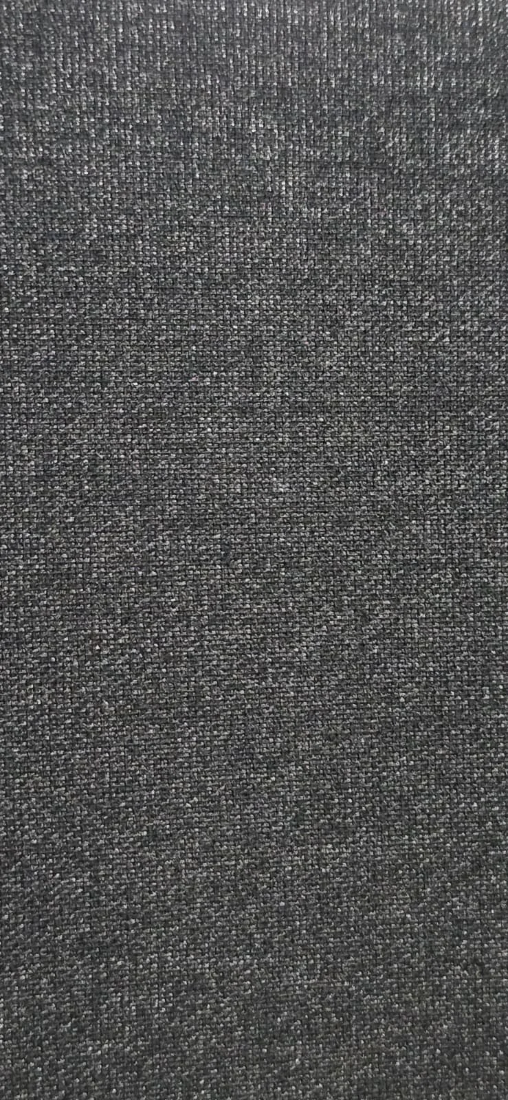 Close-up of a dark gray textured fabric surface.