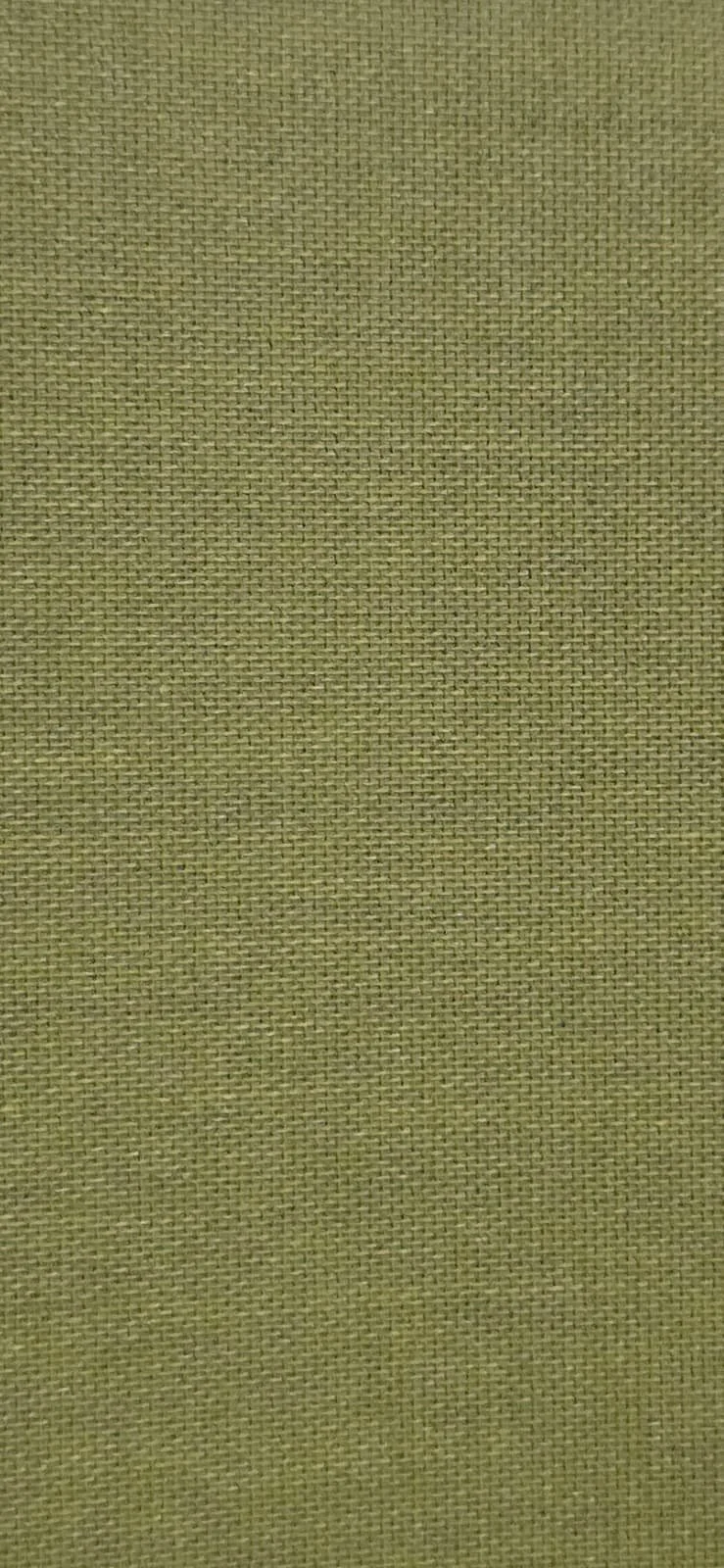 Close-up of olive green textured fabric with a woven pattern.