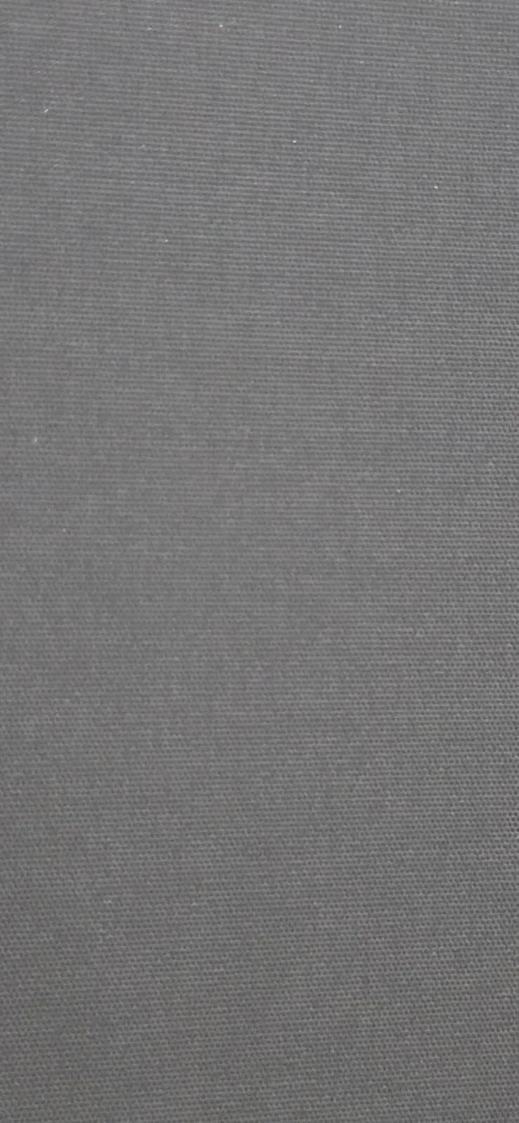 Close-up of a gray textured fabric surface