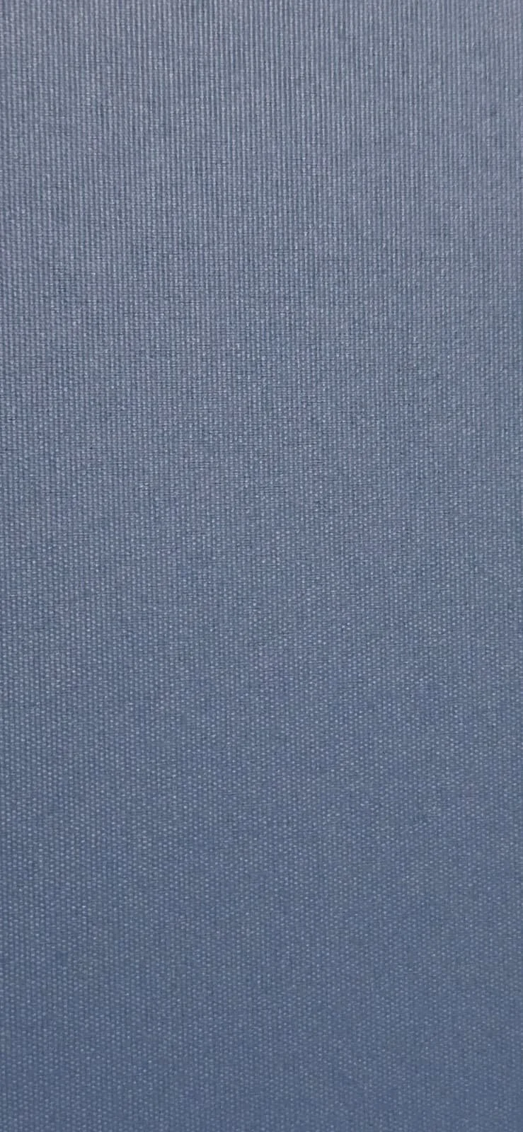 Close-up image of dark gray fabric with a fine, textured weave.