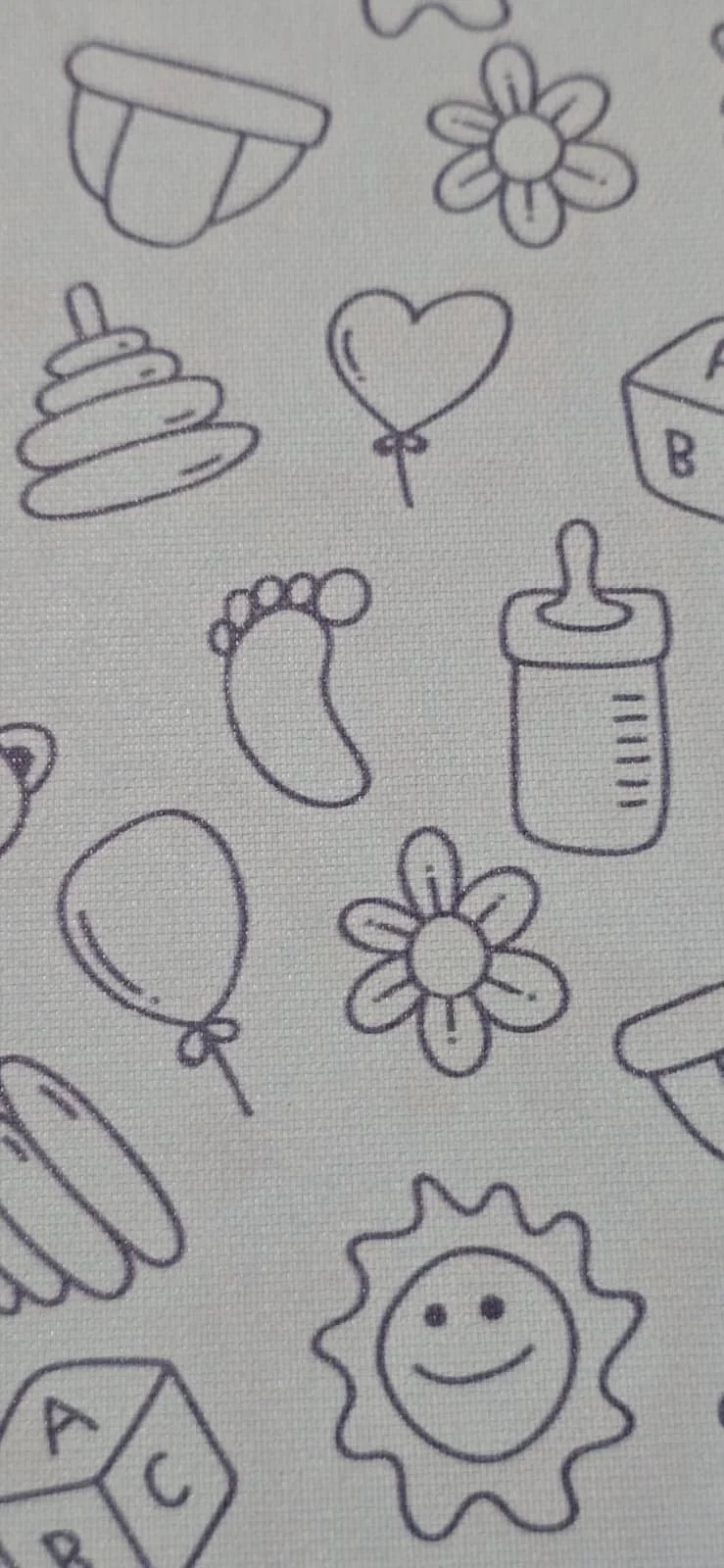 Hand-drawn doodles of a cupcake, flowers, a heart-shaped balloon, a baby bottle, a foot, a smiling sun, and a baby block with the letter A.