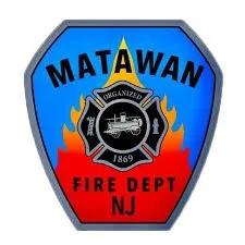 Patch of Matawan Fire Department NJ featuring a fire engine, flames, and the founding year 1869.