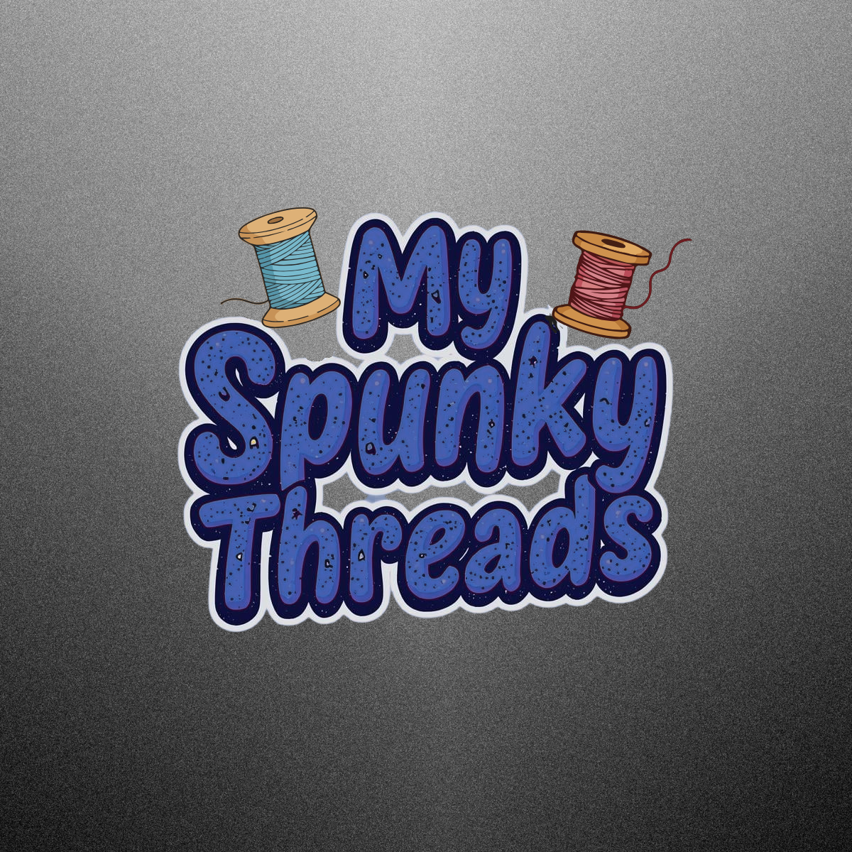 A graphic sticker with the words "My Spunky Threads" in stylized blue font, decorated with black speckles, and two colorful spools of thread above the text, one blue and one red, on a gray gradient background.