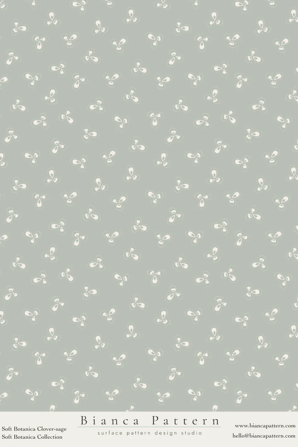 Soft botanical pattern featuring white clover flowers on a sage green background.