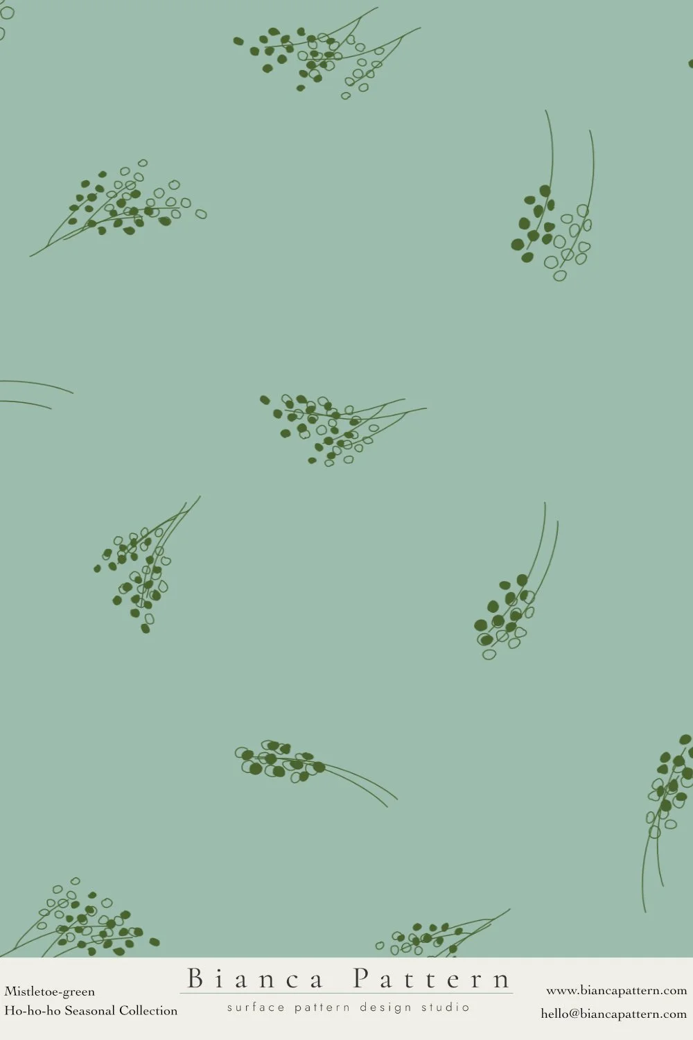 Pattern of mistletoe sprigs on a green background in a repeating arrangement.