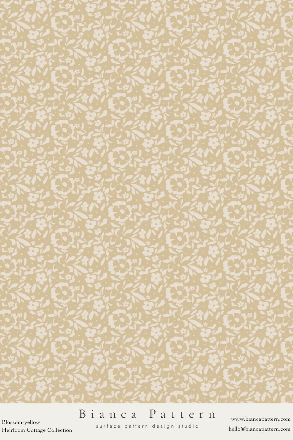 Beige floral pattern wallpaper with small white flowers and leaves, labeled 'Bianca Pattern' from Blosoom-yellow Heirloom Cottage Collection.