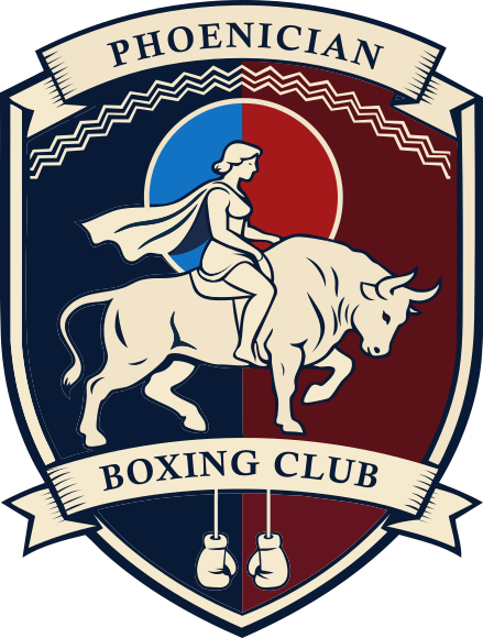 Shield-shaped emblem featuring a woman riding a bull, with a circular background divided into blue and red halves. The shield has the text 'PHOENICIAN' at the top and 'BOXING CLUB' at the bottom, with two boxing gloves hanging below.