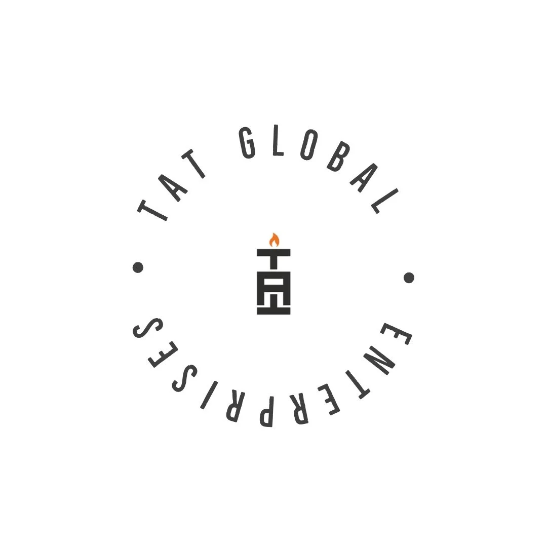 Logo featuring a black torch with a small orange flame, surrounded by the text 'TAT GLOBAL ENTREPRISES' in a circular pattern on a white background.