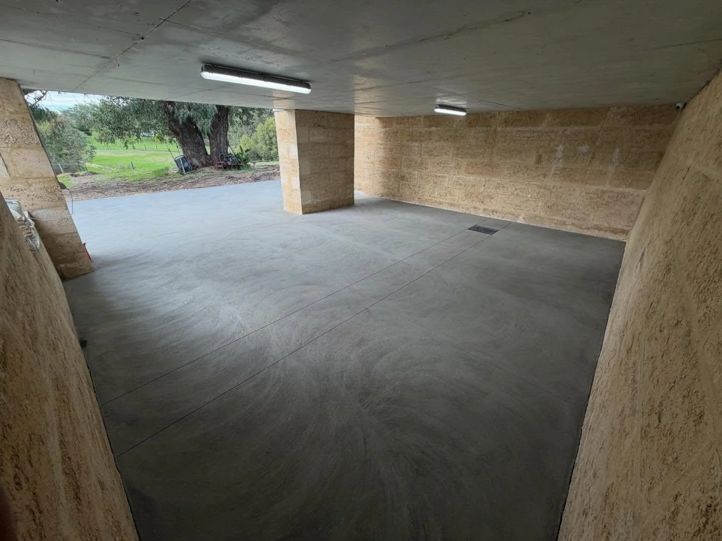 Gray non slip undercroft slab - turning this area which was damp and unusable into the ultimate place for kids to do skids and bounce basketballs off ya walls 😆😉 glad to get this in for this client as they are legends and deserve a win!