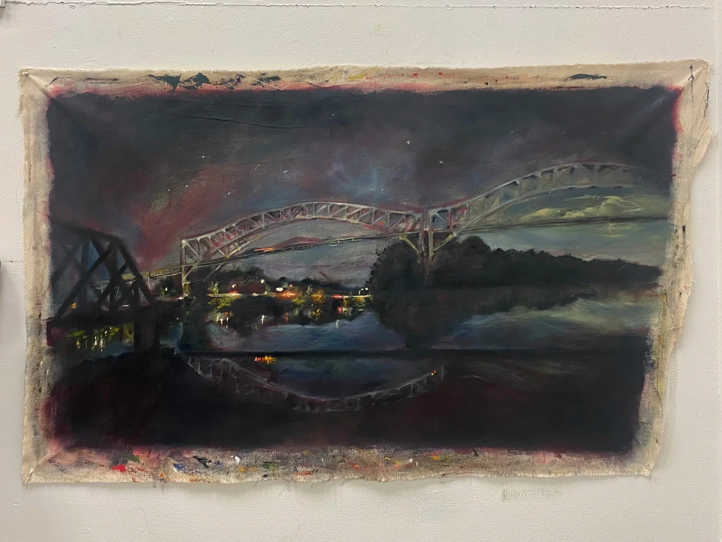 A painting of a bridge over a river at night with city lights reflecting on the water, dark cloudy sky, and silhouetted trees.