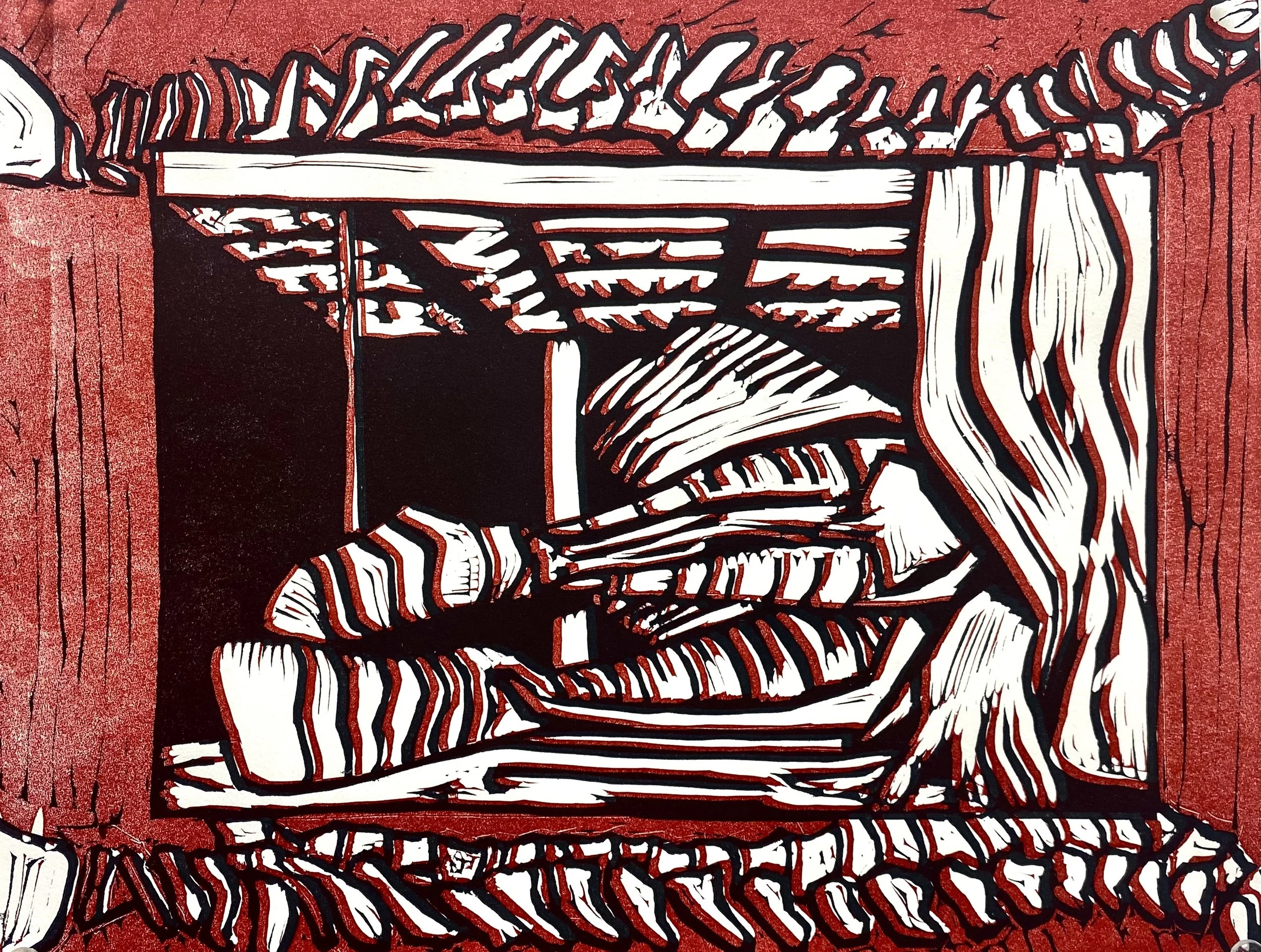 An abstract black and white print, with red background.