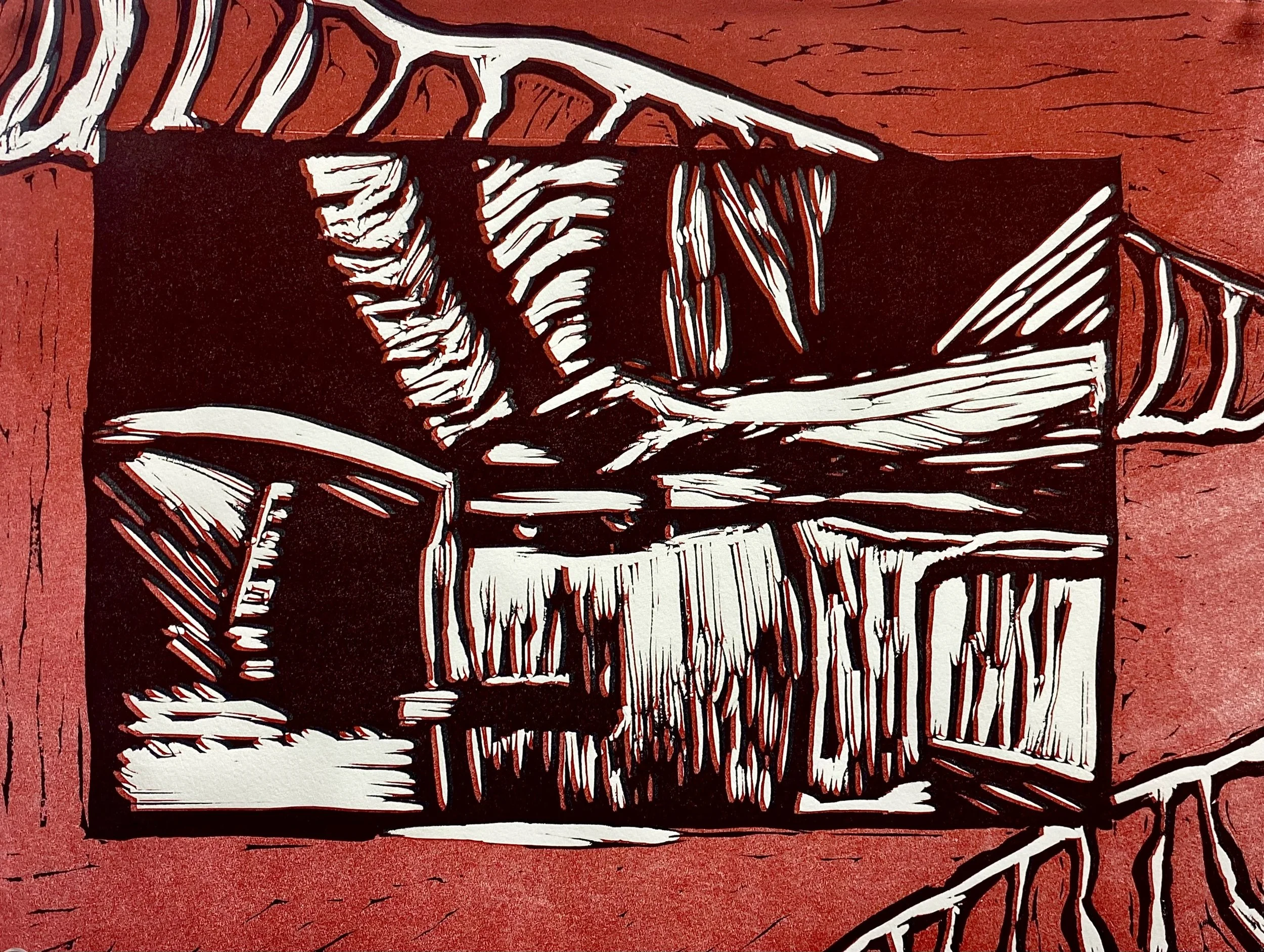 An abstract black and white print, with red background.