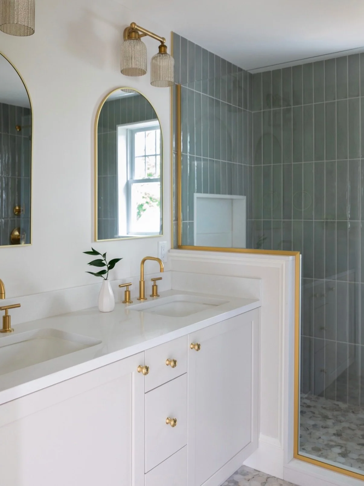 This primary bathroom renovation was designed to feel like a private retreat &mdash; layered textures, warm natural tones, custom detailing, and timeless finishes that transform everyday routines into an experience. From the seamless stonework to the