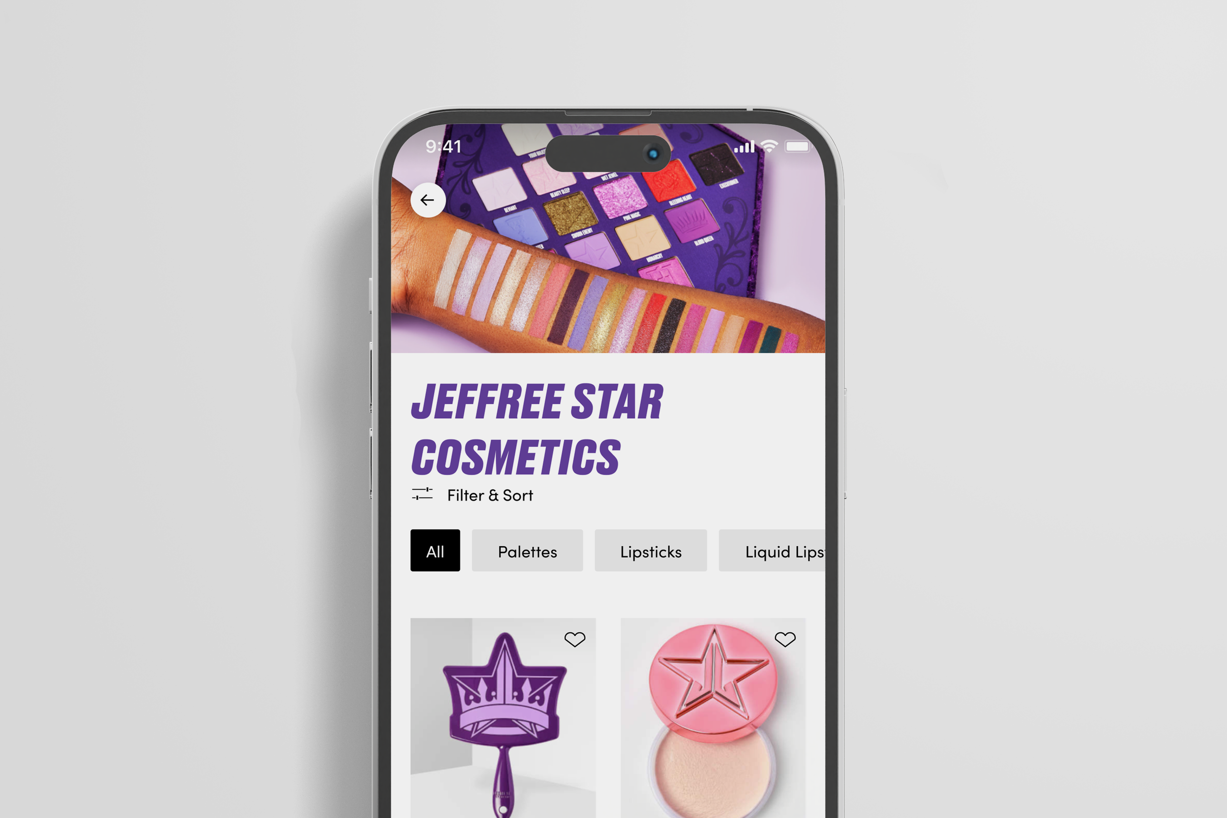 A smartphone screen displaying the Jeffree Star Cosmetics app with makeup products including palettes, lipsticks, and liquid lips. The app has filter options and a colorful palette at the top of the screen.