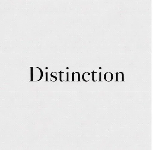 The word "Distinction" written in black font on a plain white background.