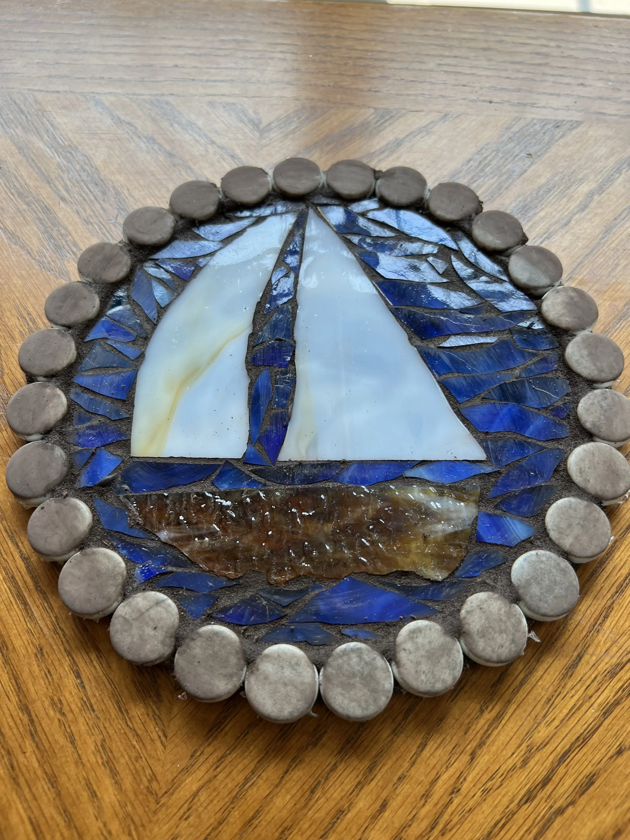 Lake Geneva Art Studio | Foundations Mosaic workshop trivet with sailboat design