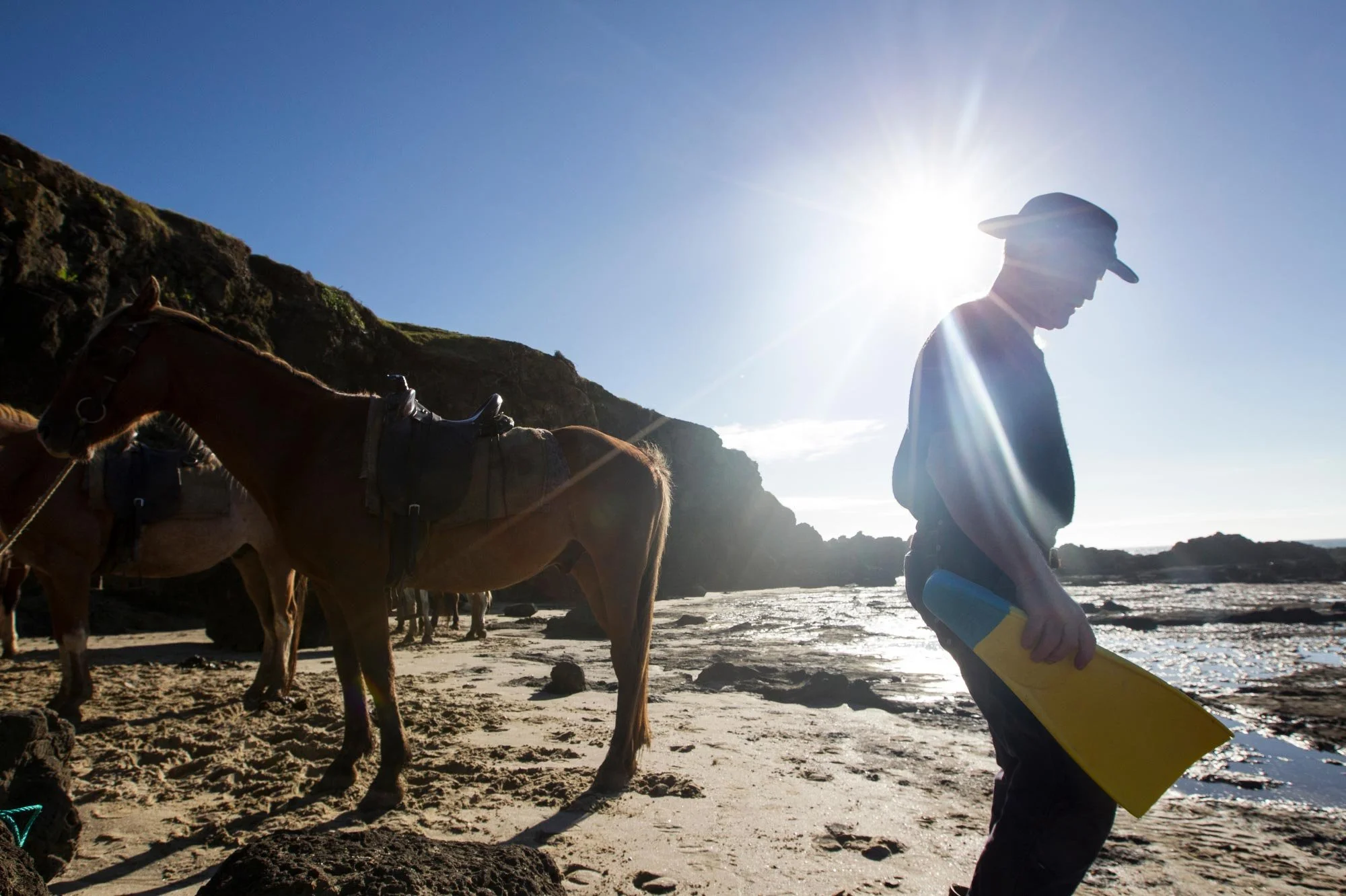 Paua fishing with cowboys, Herekino, North West Coast, New Zealand. Grant Davan, aka the Herekino dentist.