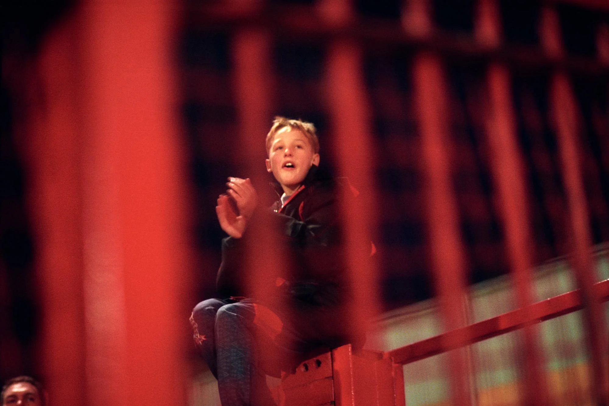 Ayrsome park. Middlesbrough Football Club. A young football fan looks on from the terraces.
