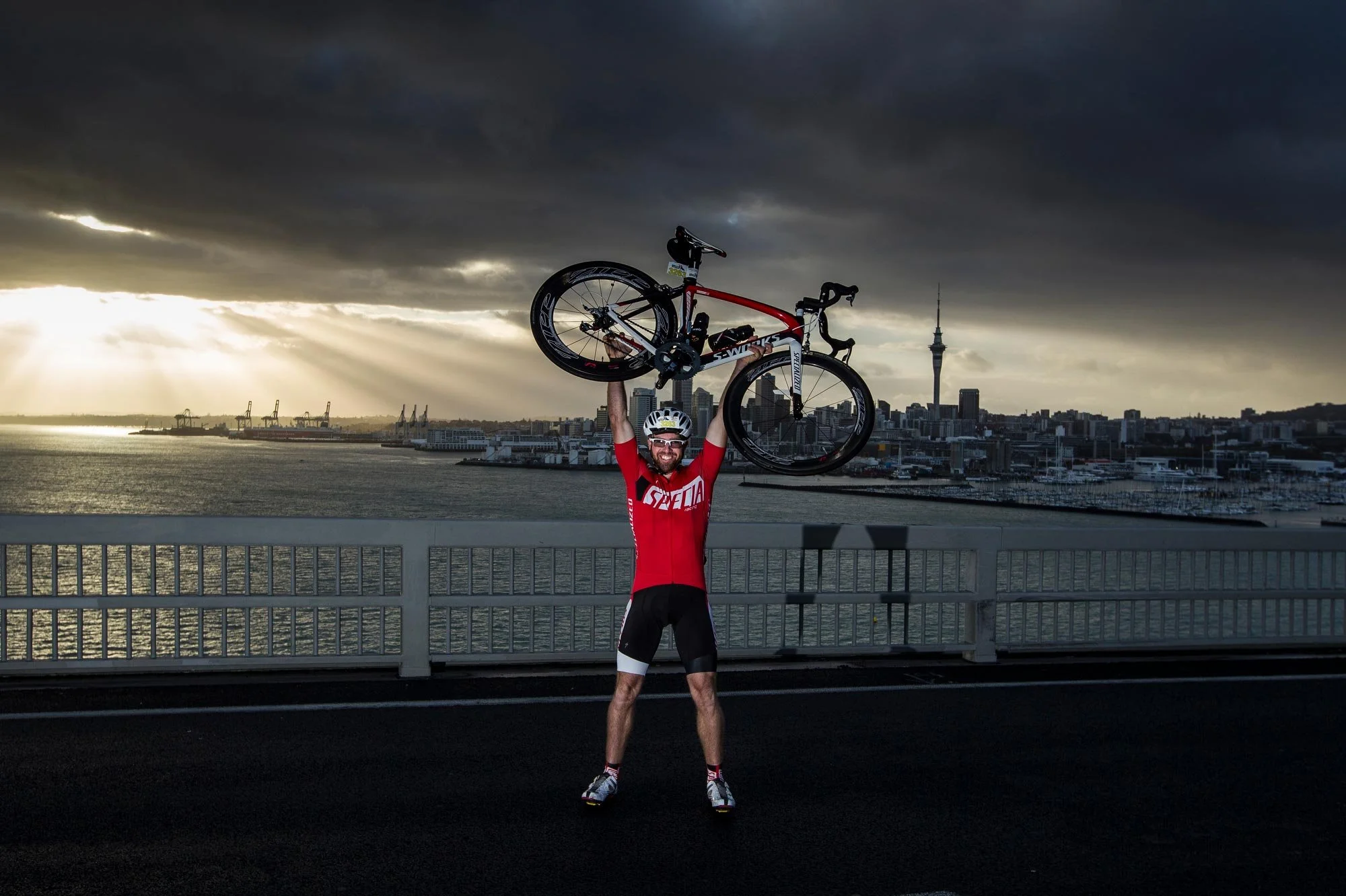 Bike the Bridge 2014. Brad Marsh stops to pose on Auckland Harbour Bridge.
Photograph by Michael Craig