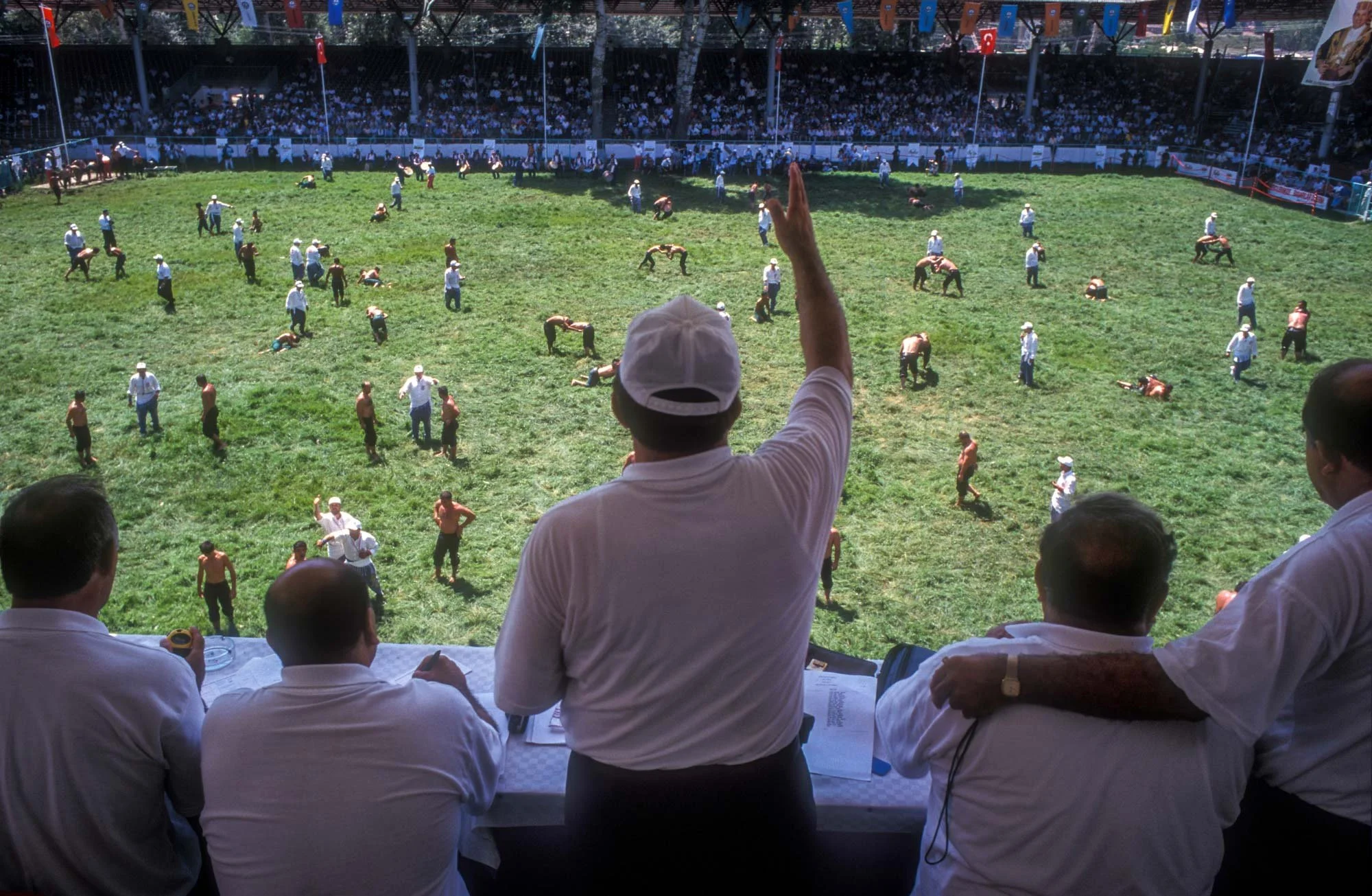 Kirkpinar Olive Oil Wrestling Festival, Edirne, Turkey.
A senior judge delivers the casting vote on the bout.