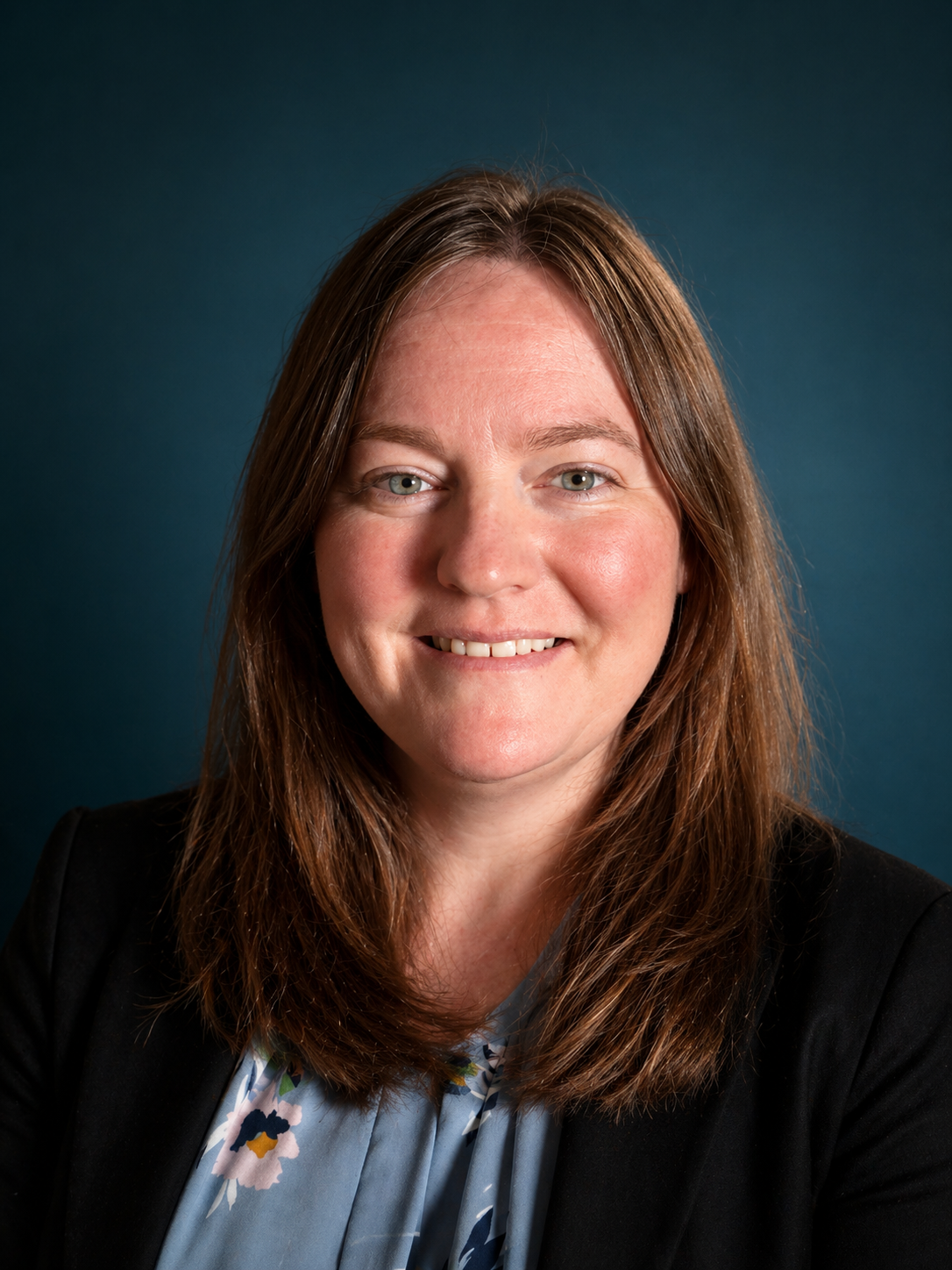 Headshot of Megan Kenny, DNP, PMHNP-BC founder of Harborlight Psychiatric NP Services PLLC