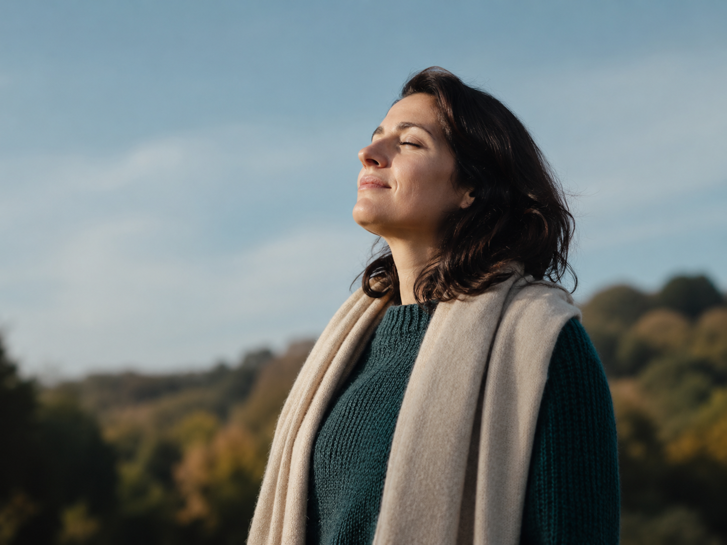 Adult standing outdoors in morning sunlight, representing non-medication approaches to depression treatment like movement and sunlight exposure
