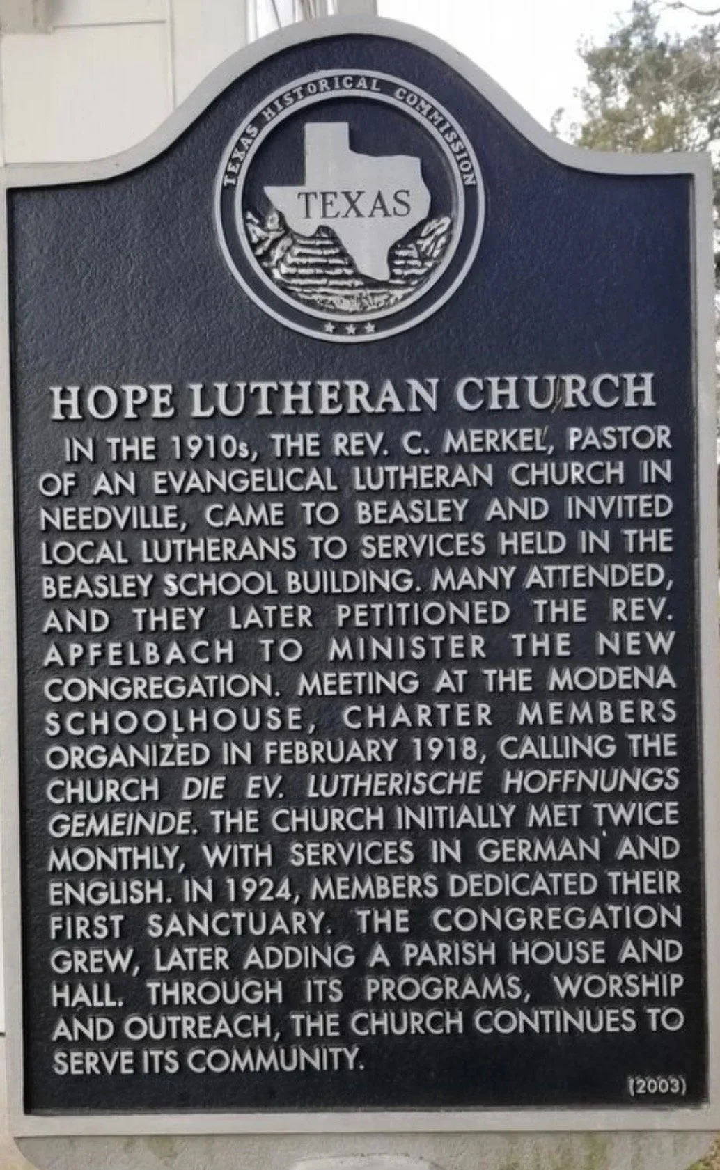 Historical marker for Hope Lutheran Church in Beasley, Texas, with the Texas Historical Commission seal at the top and a description of the church's founding and history.
