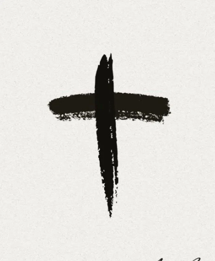 Black cross symbol on white background