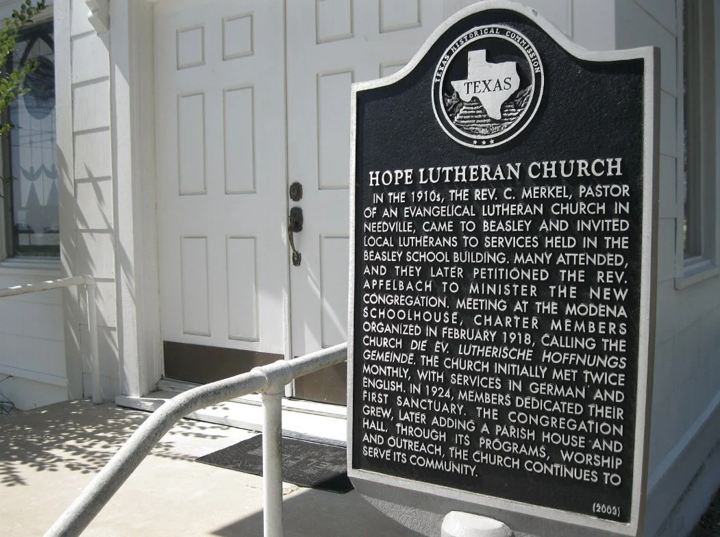 Historical marker for Hope Lutheran Church in Texas with a description of its history and founding in 1910s.
