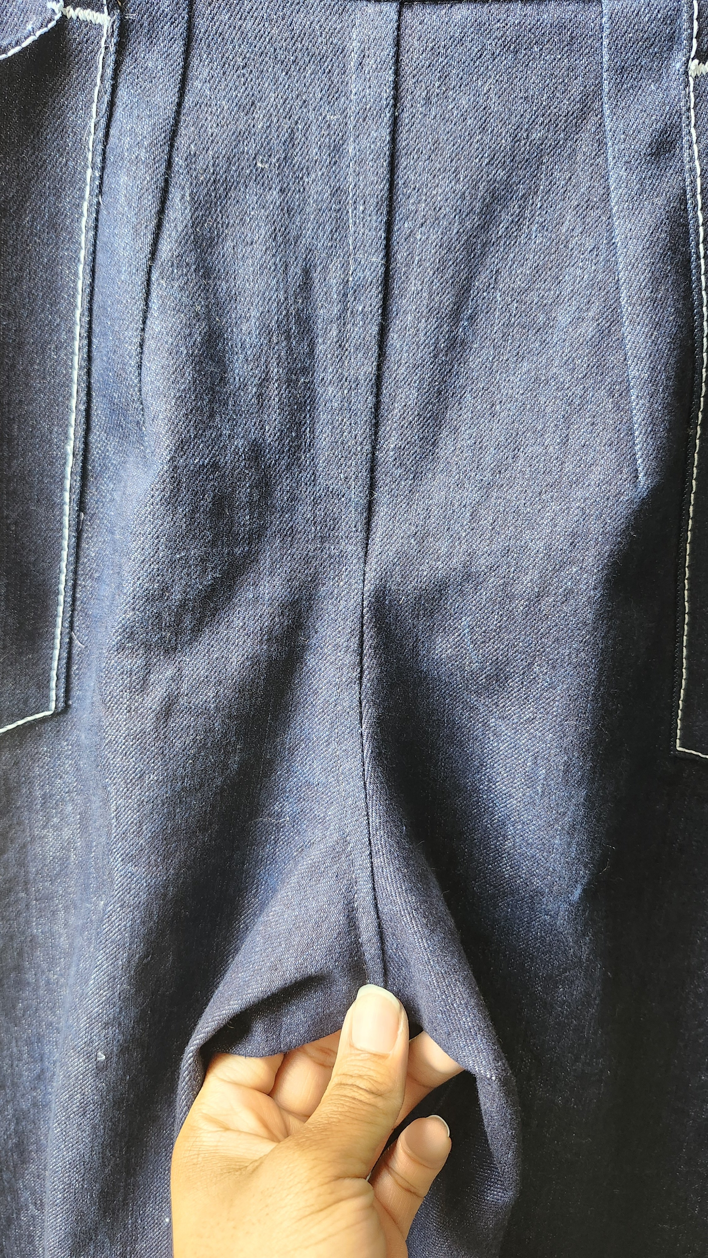 Flat felled seam crotch and darts in between back pockets